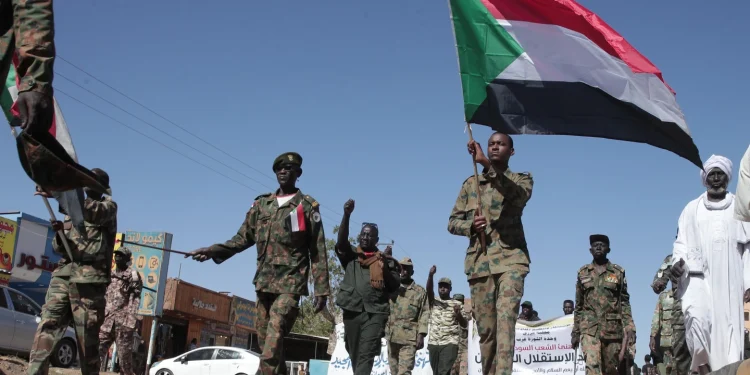 Sudanese army soldiers parade in the streets of Omdurman, a district of Khartourn, Sudan Wednesday 31. Dec. 2025, to mark the 70th anniversary of the Sudan Independence. (AP Photo/ Marwan Ali)