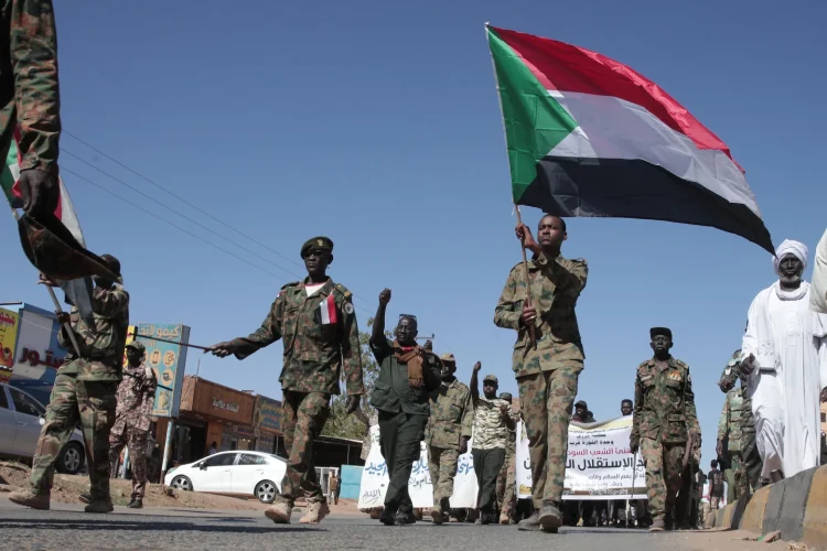 Sudanese army soldiers parade in the streets of Omdurman, a district of Khartourn, Sudan Wednesday 31. Dec. 2025, to mark the 70th anniversary of the Sudan Independence. (AP Photo/ Marwan Ali)