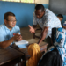 A member (1st L) of the 35th Chinese medical team in Zanzibar provides free medical services on Pemba Island of Zanzibar, Tanzania, on Jan. 20, 2026. Chinese medical experts on Tuesday launched the "100 Medical Teams in 1,000 Villages" free medical services program at a community health service center on Pemba Island in Tanzania's Zanzibar.(The 35th Chinese medical team in Zanzibar/Handout via Xinhua)