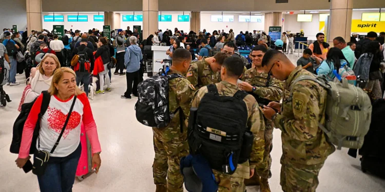 Passengers wait at Luis Munoz Marin International Airport as all flights are cancelled following US military action in Venezuela, on January 3, 2026, in Carolina, Puerto Rico.
Miguel J. Rodriguez Carrillo | Afp | Getty Images