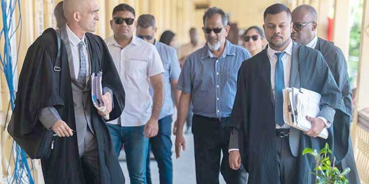 Azruddin Mohamed, Nazar Mohamed and legal team (Guyana Chronicle photo)
