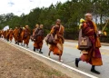 Buddhist monks on a “Walk for Peace” walk on Veterans Parkway in Fayetteville, Ga., on Monday, Dec. 29, 2025, from Texas to Washington, D.C. (Arvin Temkar/Atlanta Journal-Constitution via AP)