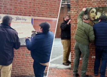 Workmen removing slavery exhibit at Philadelphia’s Independence National Historical Park