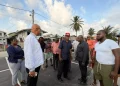 Minister of Public Works Bishop Juan Edghill engages B Field Sophia vendors on Tuesday