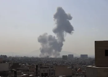 A plume of smoke rises following an explosion in Tehran on Saturday.Credit...Atta Kenare/Agence France-Presse — Getty Images