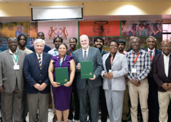 University of Guyana’s Vice-Chancellor Professor Paloma Mohamed Martin, with Dr Robert Robertson, Senior Research Fellow, Commonwealth Institute School of Advanced Studies, University of London and Dr. Bryan DePoy, Provost of Saint Leo University, along with other Conclave participants in the Education Lecturer Theater (ELT) University of Guyana’s Turkeyen Campus.