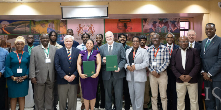 University of Guyana’s Vice-Chancellor Professor Paloma Mohamed Martin, with Dr Robert Robertson, Senior Research Fellow, Commonwealth Institute School of Advanced Studies, University of London and Dr. Bryan DePoy, Provost of Saint Leo University, along with other Conclave participants in the Education Lecturer Theater (ELT) University of Guyana’s Turkeyen Campus.