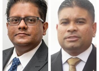 Minister within the Ministry of Finance Dr. Ashni Singh and Leader of the Opposition Azruddin Mohamed