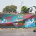 Two students carry the Georgetown Mayor and City Council banner during the Black History Month March on February 27, 2026, proudly displaying the message “Black History: Honouring the Past, Inspiring the Future” as participants proceeded from City Hall to Independence Park.