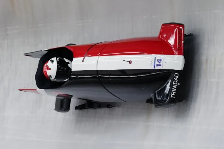 Axel Brown and De Aundre John of Trinidad and Tobago take part in a two-man bobsled training run Friday at the Milan-Cortina Olympics. (Richard Heathcote / Getty Images)