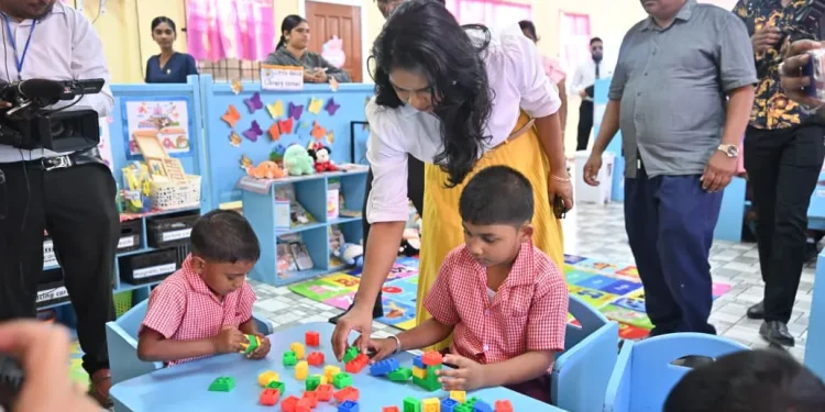Minister of Education Sonia Parag engages a student at the new Mibicuri Nursery School
