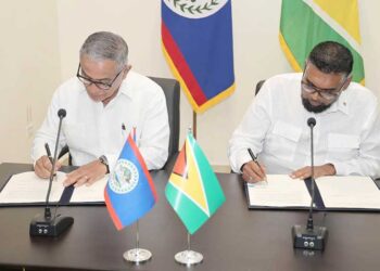 Following the formal addresses at the Belizean National Assembly for a special Joint Sitting of the House of Representatives and the Senate, President Dr. Irfaan Ali and Belize Prime Minister John Briceño inked several Memoranda of Understanding (Government of Belize Press Office photo)