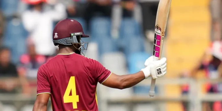 West Indies captain Shai Hope celebrates reaching his half-century during the T20 World Cup cricket match against Nepal in Mumbai, India, on February 15, 2026 [Rafiq Maqbool/AP]