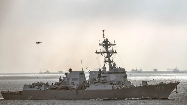FILE - U.S. warship the USS Truxtun sails in Bosporus Strait en route to the Black Sea, in Istanbul, Turkey, March 7, 2014. (AP Photo/Emrah Gurel, file)