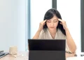 Sitting too long may negatively impact brain health.
Lu ShaoJi / Getty Images