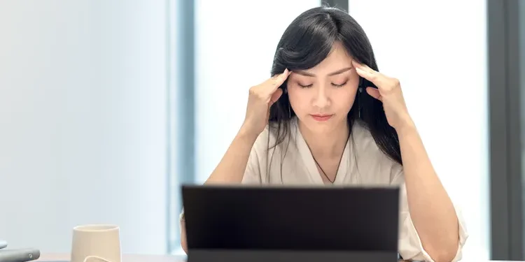 Sitting too long may negatively impact brain health.
Lu ShaoJi / Getty Images