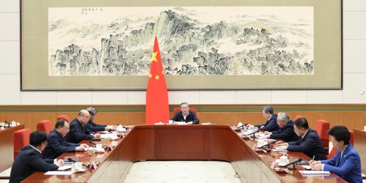 Chinese Premier Li Qiang presides over a State Council group study session focused on artificial intelligence (AI) development on Feb. 11, 2026. Li on Wednesday called for a comprehensive push in the technological innovation, industrial growth and application of AI to foster new quality productive forces and promote high-quality development. (Xinhua/Huang Jingwen)
