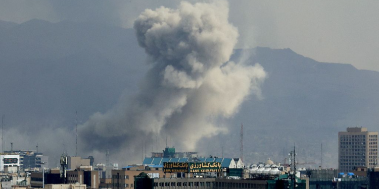 A plume of smoke acends after a military strike on the capital Tehran, Iran, March 2, 2026. /VCG