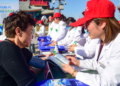 Medical staff explain tuberculosis prevention and control knowledge to people at an event in Cangzhou, north China's Hebei Province, March 22, 2025. /VCG