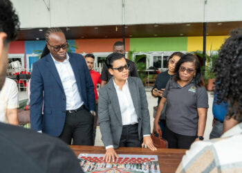 Minister of Tourism, Industry and Commerce, Susan Rodrigues, met with Minister within the Ministry of Culture, Youth and Sport, Steven Jacobs flanked by their teams