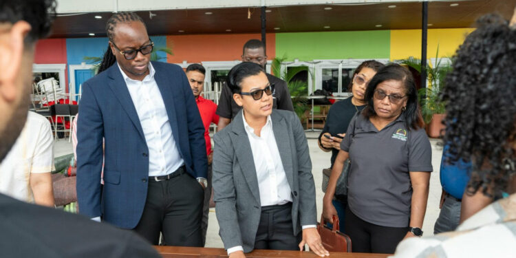 Minister of Tourism, Industry and Commerce, Susan Rodrigues, met with Minister within the Ministry of Culture, Youth and Sport, Steven Jacobs flanked by their teams