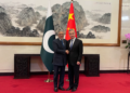 Chinese Foreign Minister Wang Yi (R), also a member of the Political Bureau of the Communist Party of China Central Committee, meets with Pakistani Deputy Prime Minister and Foreign Minister Mohammad Ishaq Dar in Beijing, China, March 31, 2026. /CGTN