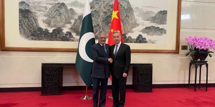 Chinese Foreign Minister Wang Yi (R), also a member of the Political Bureau of the Communist Party of China Central Committee, meets with Pakistani Deputy Prime Minister and Foreign Minister Mohammad Ishaq Dar in Beijing, China, March 31, 2026. /CGTN