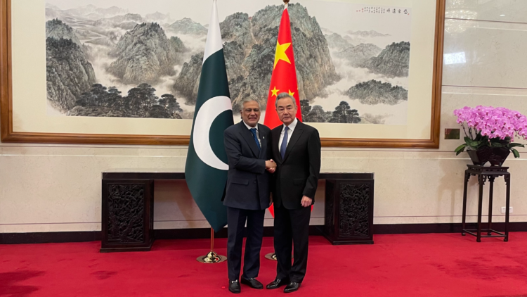 Chinese Foreign Minister Wang Yi (R), also a member of the Political Bureau of the Communist Party of China Central Committee, meets with Pakistani Deputy Prime Minister and Foreign Minister Mohammad Ishaq Dar in Beijing, China, March 31, 2026. /CGTN