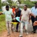 Christopher Ali being transported to the New Amsterdam Hospital after being brought out injured from the Berbice River