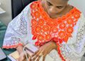 Athalyah Yisrael Author Signing Copies for the Book 7F's To A Financially fullfiling Legacy
