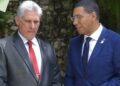 Cuban President Miguel Díaz-Canel Bermúdez in conversation with Jamaica's Prime Minister Dr. Andrew Holness