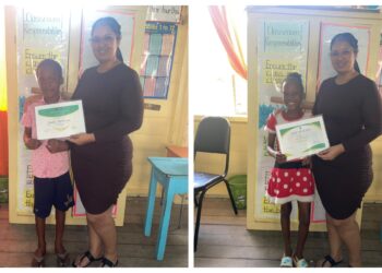 Jadon and Tiana DeCourte receiving their certificates from STEMGuyana