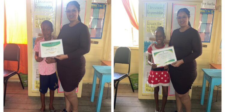Jadon and Tiana  DeCourte receiving their certificates from STEMGuyana