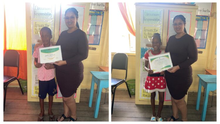 Jadon and Tiana DeCourte receiving their certificates from STEMGuyana
