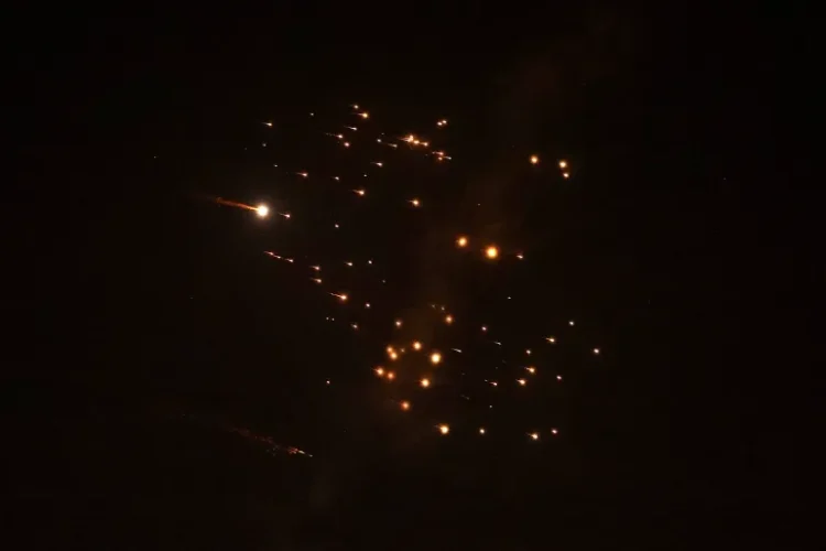 Rocket trails are seen in the sky amid a new barrage of Iranian missile attacks above the Israeli coastal city of Netanya, on March 18, 2026 [Jack Guez/AFP]