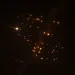 Rocket trails are seen in the sky amid a new barrage of Iranian missile attacks above the Israeli coastal city of Netanya, on March 18, 2026 [Jack Guez/AFP]