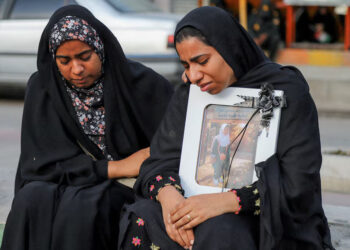 People mourn on the day of the funeral of the victims following a reported strike on a school in Minab, Iran, March 3, 2026. Amirhossein Khorgooei/ISNA/WANA (West Asia News Agency) via REUTERS Purchase Licensing Rights