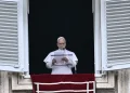 Pope Leo XIV gives a speech to the pilgrims gathered in St. Peter's Square during the Sunday Angelus prayer at the Vatican on March 15, 2026. (Photo by Filippo MONTEFORTE / AFP)