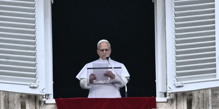 Pope Leo XIV gives a speech to the pilgrims gathered in St. Peter's Square during the Sunday Angelus prayer at the Vatican on March 15, 2026. (Photo by Filippo MONTEFORTE / AFP)