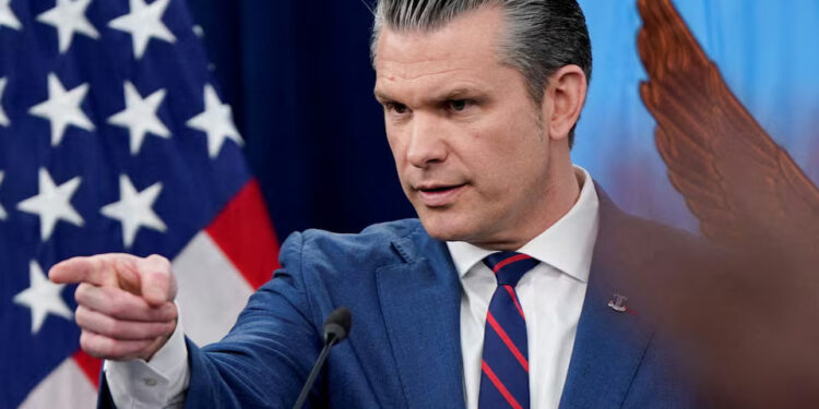 U.S. Secretary of Defense Pete Hegseth holds a briefing amid the U.S.-Israeli conflict with Iran, at the Pentagon in Washington, D.C., U.S., March 2, 2026. REUTERS/Elizabeth Frantz Purchase Licensing Rights