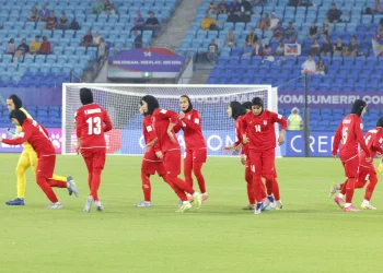 This photo taken on March 8, 2026 shows Iranian players running towards their positions at the start of the AFC Women's Asian Cup Australia 2026 football match between Iran and the Philippines on the Gold Coast.
STR/AFP/via Getty Images