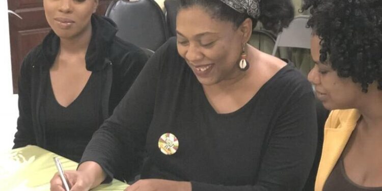Dr. Karen Abrams (centre) STEMGuyana Founder and Executive Director