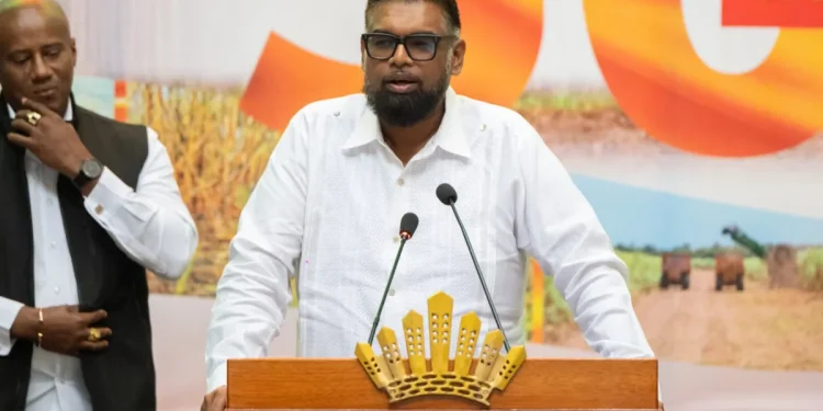 President Mohamed Irfaan Ali delivers the feature address at GAWU’s 50th Anniversary held at ACCC (DPI photo)