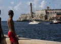 One of two sailboats carrying humanitarian aid is towed into shore in Havana on Saturday. The vessels, carrying at least eight people, departed from Isla Mujeres in southern Mexico on March 20 and then lost contact, fueling concern in Mexico, Cuba and beyond.Ramon Espinosa / AP