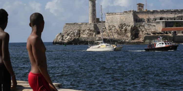 One of two sailboats carrying humanitarian aid is towed into shore in Havana on Saturday. The vessels, carrying at least eight people, departed from Isla Mujeres in southern Mexico on March 20 and then lost contact, fueling concern in Mexico, Cuba and beyond.Ramon Espinosa / AP