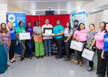 Minister of Health Dr Frank Anthony hands over the thermal ablation devices (DPI photo)