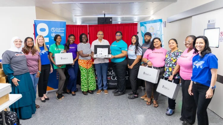 Minister of Health Dr Frank Anthony hands over the thermal ablation devices (DPI photo)