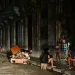 Cubans chat at night on a street during a nationwide blackout caused by a grid failure in Havana on October 18, 2024. Alberto Roque/AFP via Getty Images