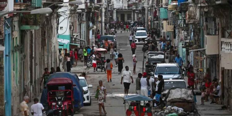 People gather on the street during an electricity blackout in Havana, Cuba [AFP]
