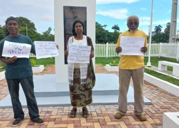 Member of the Coalition for the 1823 Monument staging a protest in July 2025